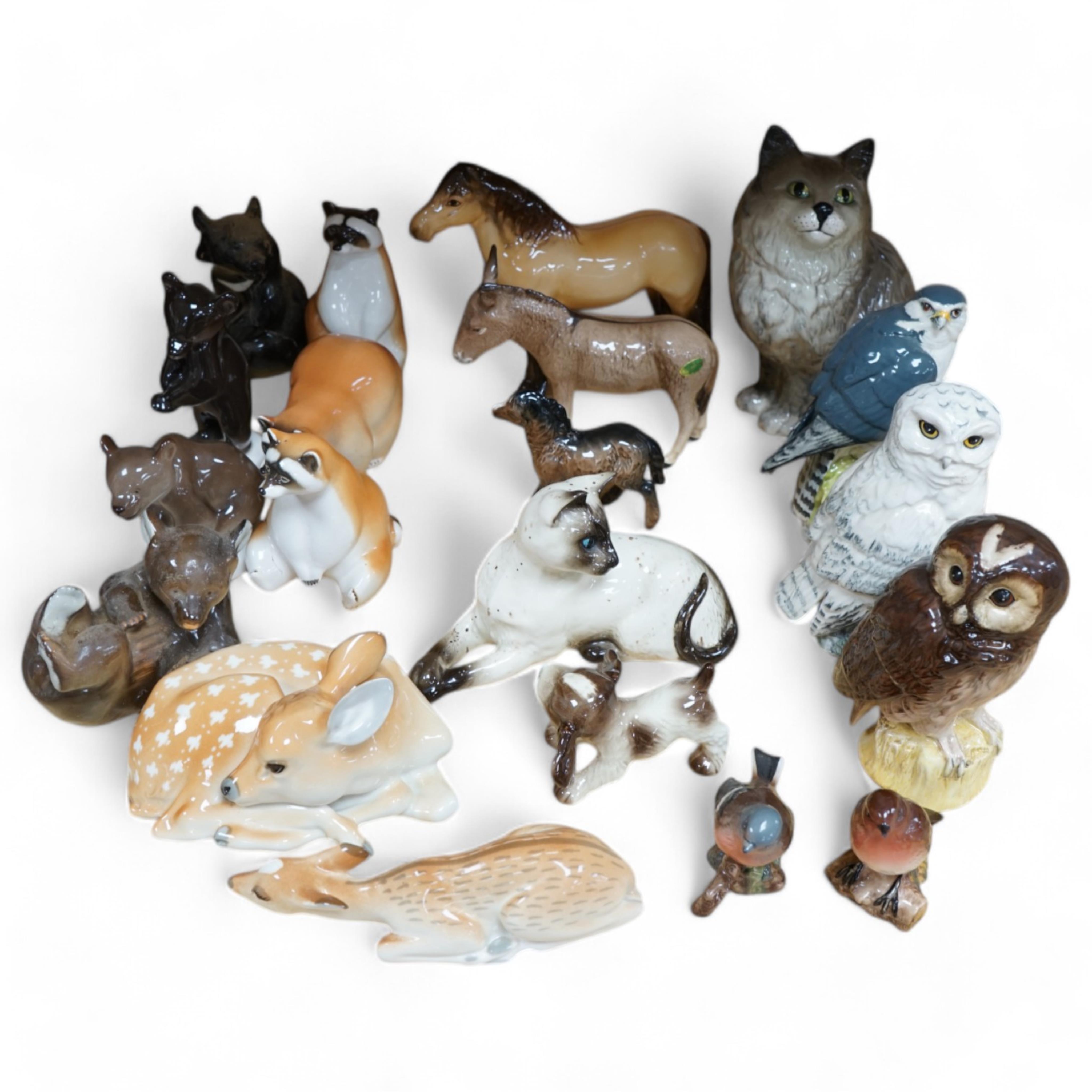 A collection of Russian, Beswick, Doulton and other animal ornaments. Condition - varies